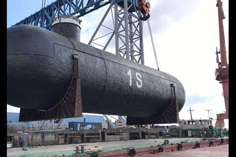 One of the four cargo tanks being loaded onto a barge in Qidong before transhipment in Shanghai. (copyright: Logistics Plus)